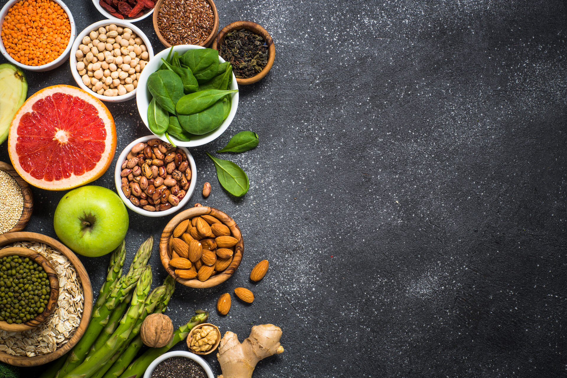 superfoods-on-black-stone-background-2021-08-26-18-07-39-utc